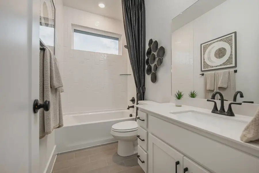 Representative furnished interior of a home built from the Charlene by Chesmar Homes in Meyer Ranch, New Braunfels (Image 19).