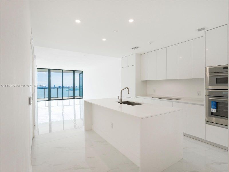 Furnished interior view inside a new home in Aria Reserve, Miami (Image 3).