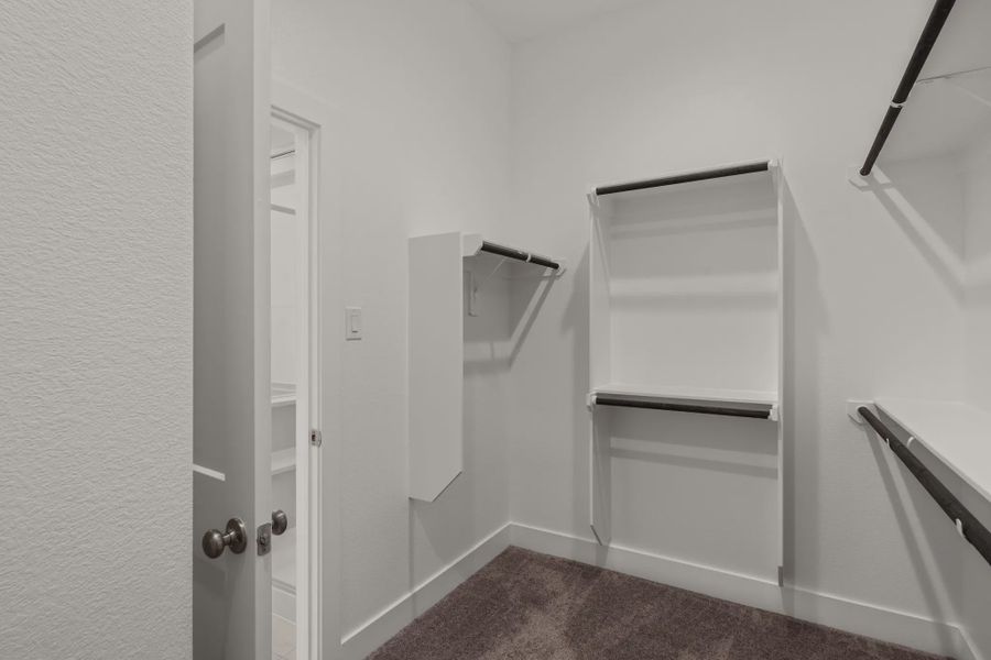Representative furnished interior of a home built from the Fairway by Chesmar Homes in Riceland Alley Loads, Mont Belvieu (Image 9).
