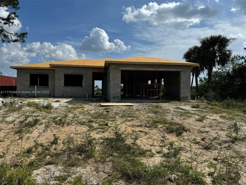 Front exterior of a new home in , Labelle, FL, highlighting curb appeal (Image 11). Front exterior of a new home in , Labelle, FL, highlighting curb appeal (Image 11).