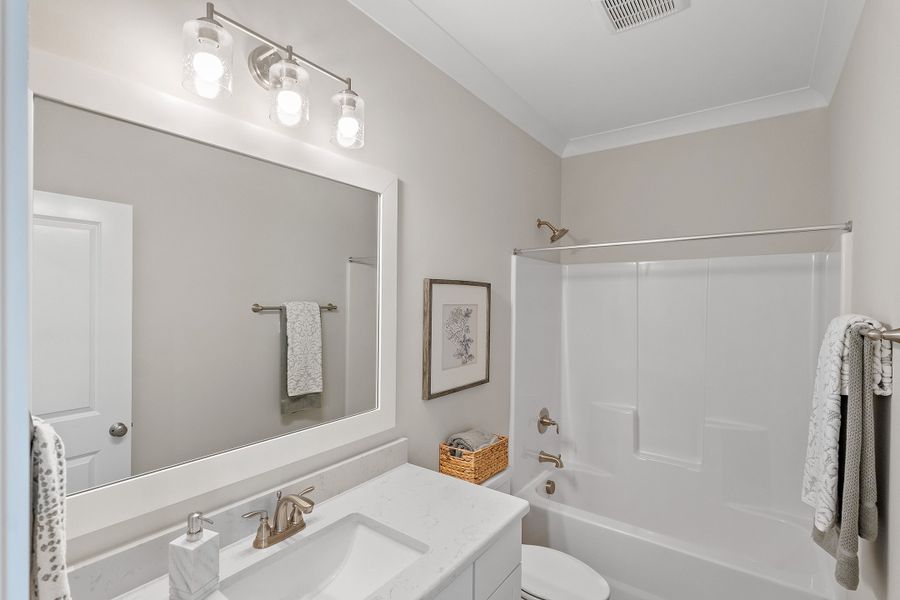 Representative furnished interior of a home built from the Grantville by Bill Clark Homes in The Sanctuary at Sunset Beach, Sunset Beach (Image 20).