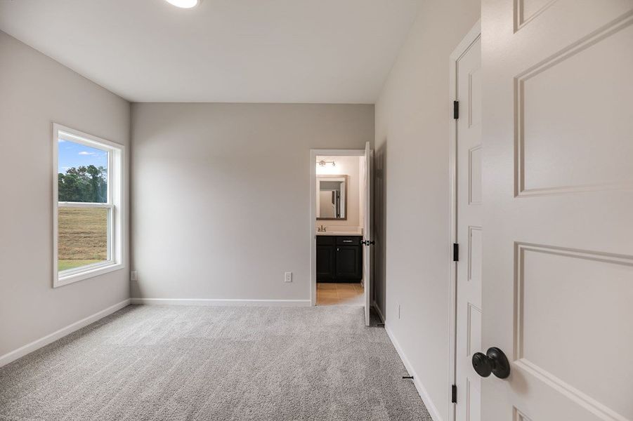 Spacious, unfurnished interior of a new home in Parmer Farms, Roopville (Image 29).