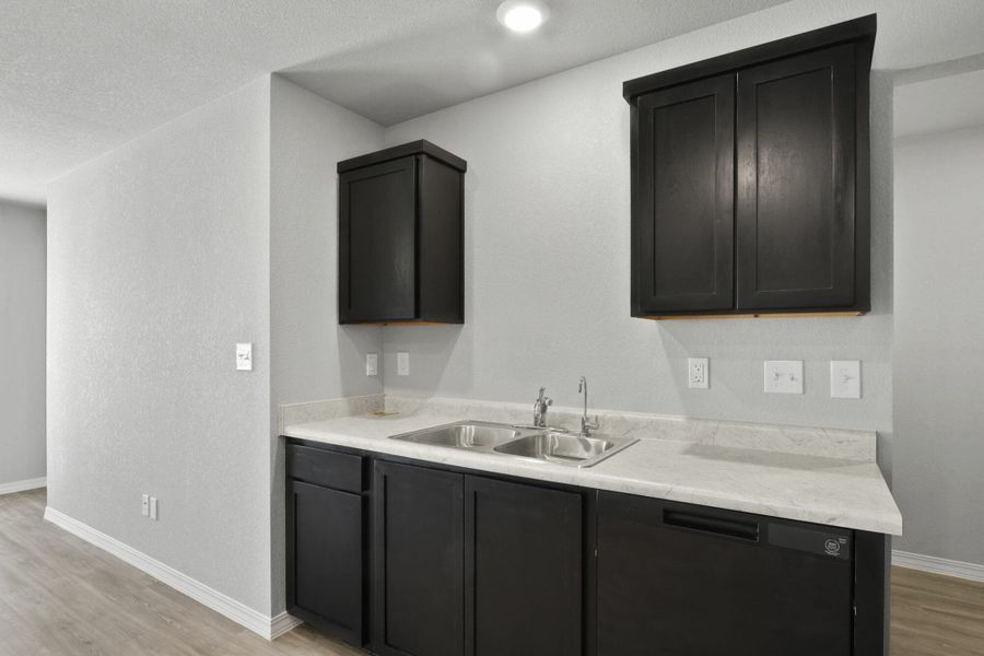 Furnished interior view inside a new home in Rancho Desierto Bello, El Paso (Image 8).
