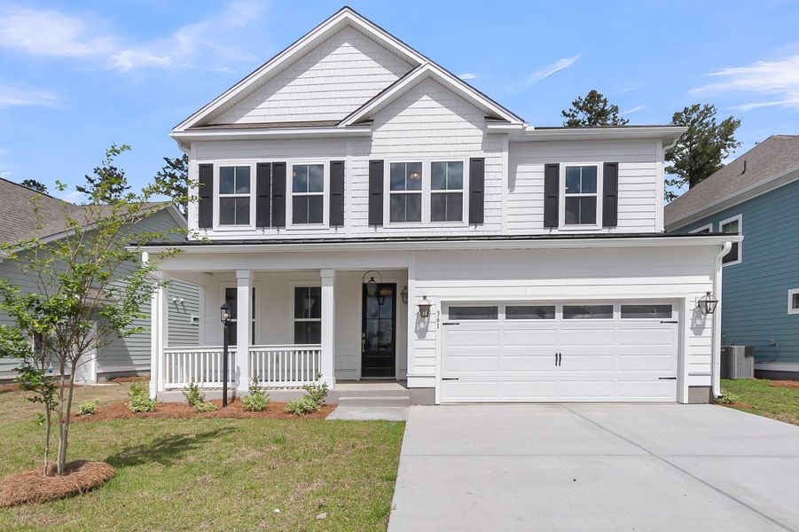 Front exterior of a new home in Phillips Crossing, Ridgeville, SC, highlighting curb appeal (Image 18).