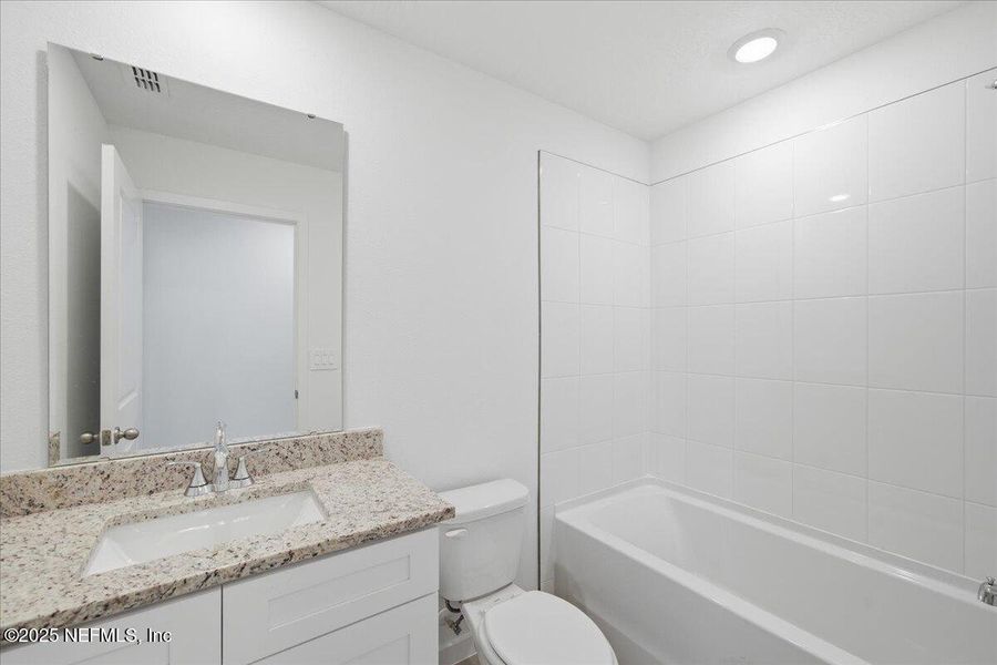 Furnished interior view inside a new home in Azalea Creek, Jacksonville (Image 9).