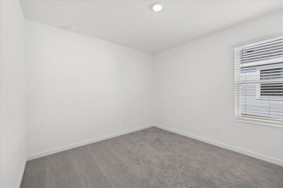 Spacious, unfurnished interior of a new home in Colbert Landings, Palm Coast (Image 21).