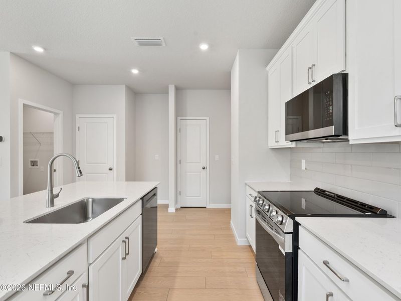 Furnished interior view inside a new home in Seminole Palms, Palm Coast (Image 5).
