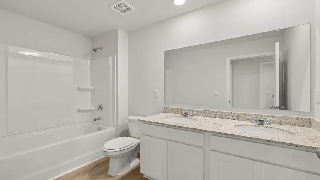 Representative furnished interior of a home built from the Aisle by D.R. Horton in Rolling Meadows, Jasper (Image 13).