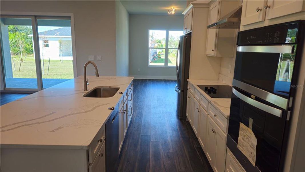 Furnished interior view inside a new home in , Port Charlotte (Image 9).