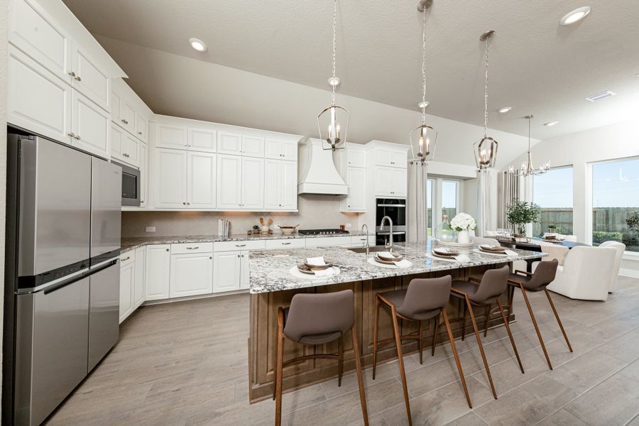 Furnished interior view inside a new home in Ellwood, Iowa Colony (Image 6).