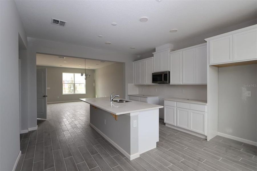 Furnished interior view inside a new home in Tribute at Ovation, Winter Garden (Image 11). Furnished interior view inside a new home in Tribute at Ovation, Winter Garden (Image 11).