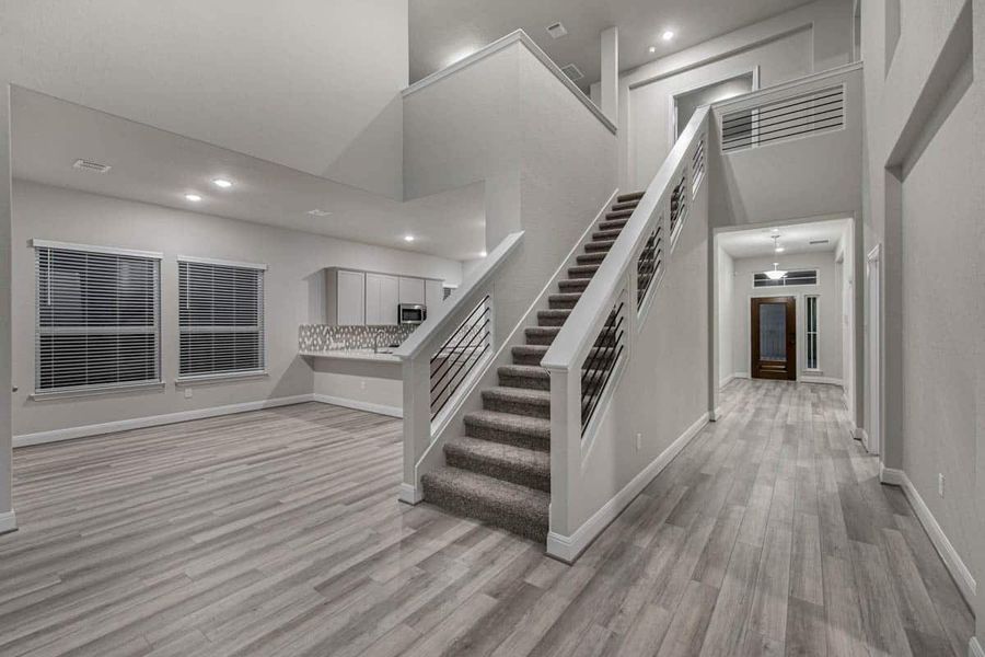 Representative unfurnished interior of a home built from the Shenandoah by Chesmar Homes in Berry Creek Highlands, Georgetown (Image 12).