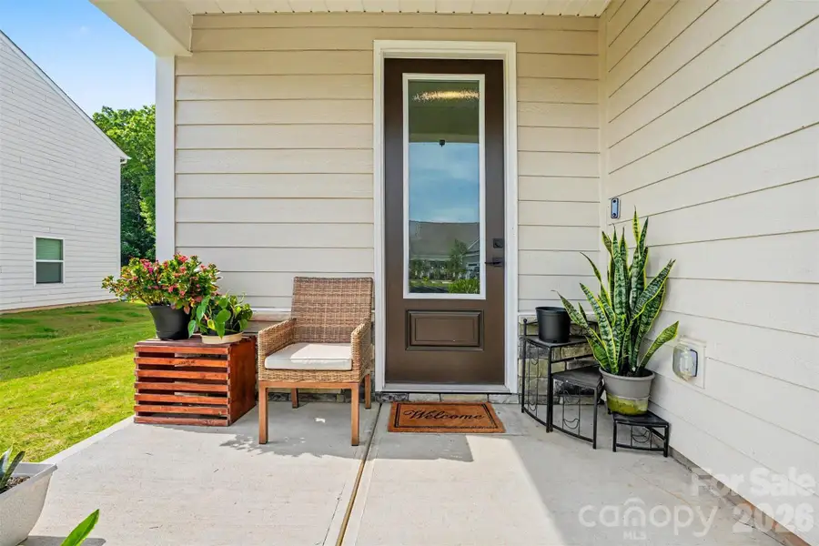 Exterior details and patio area of a home in Colonial Crossing, Troutman (Image 3).