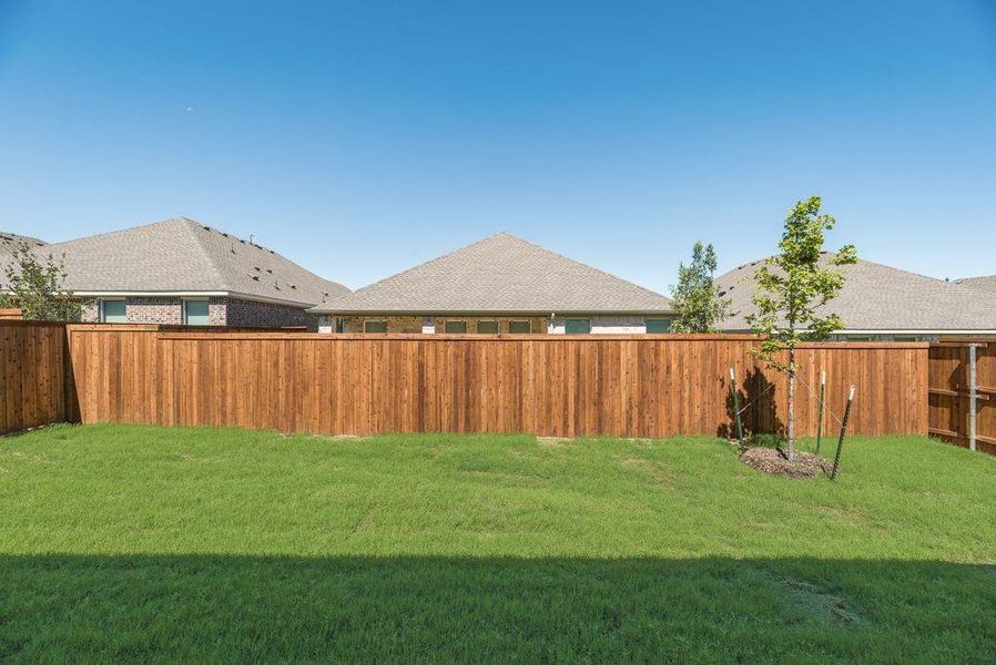 Front exterior of a new home in Legacy Hills: Classic Collection, Celina, TX, highlighting curb appeal (Image 13). Front exterior of a new home in Legacy Hills: Classic Collection, Celina, TX, highlighting curb appeal (Image 13).