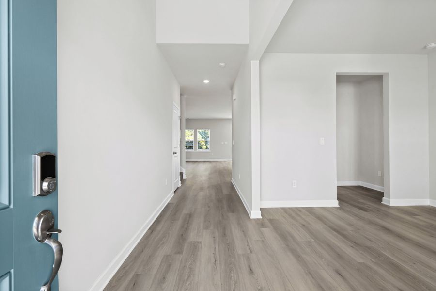Spacious, unfurnished interior of a new home in Waterside - Coastline Series, Longs (Image 11).