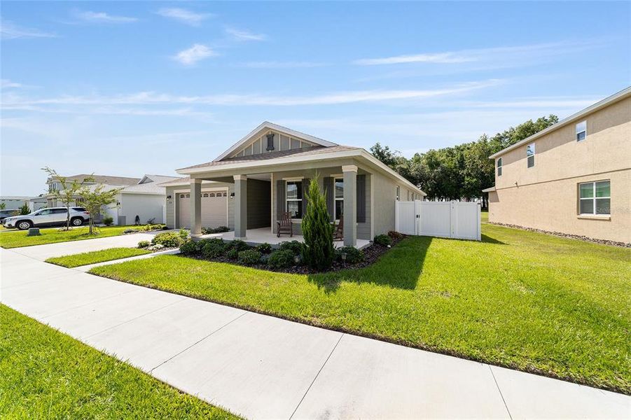 Front exterior of a new home in , Ocala, FL, highlighting curb appeal (Image 25). Front exterior of a new home in , Ocala, FL, highlighting curb appeal (Image 25).