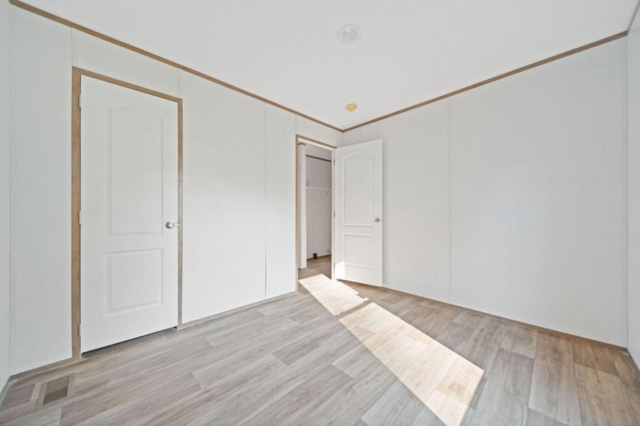 Spacious, unfurnished interior of a new home in , St. Matthews (Image 26).