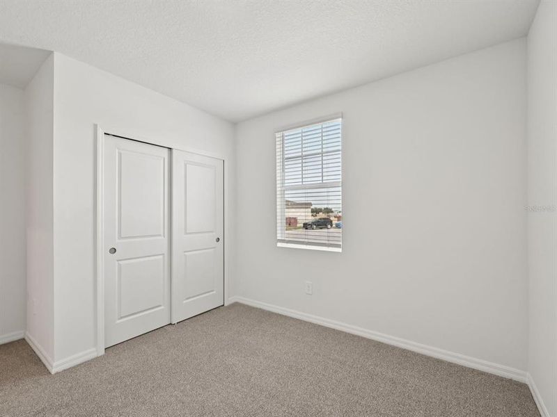 Spacious, unfurnished interior of a new home in The Reserve at Van Oaks, Auburndale (Image 11).
