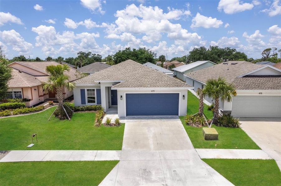 Front exterior of a new home in , Port Charlotte, FL, highlighting curb appeal (Image 21).