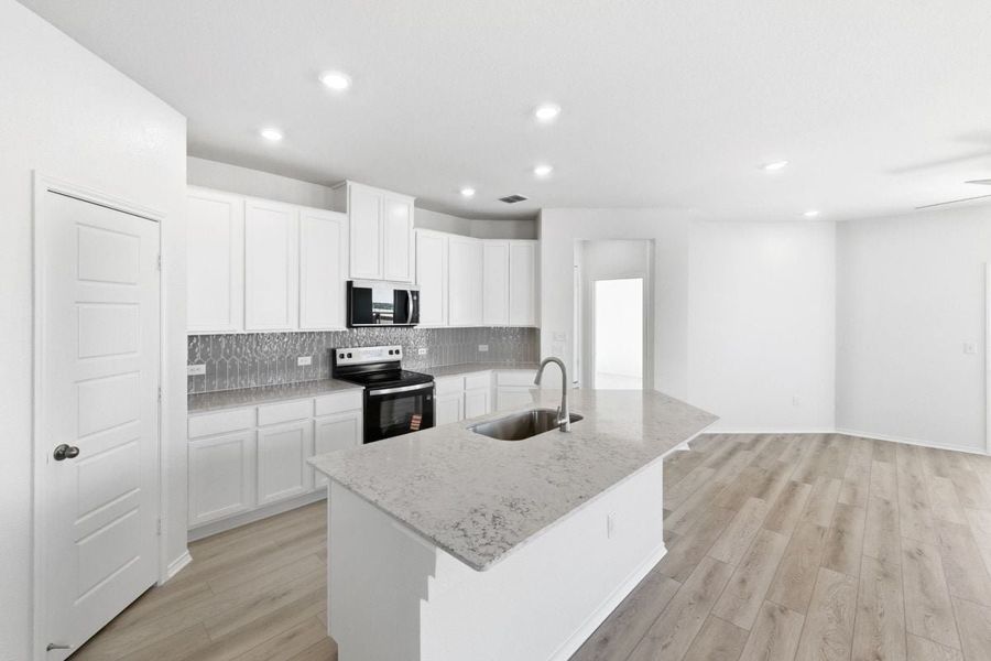 Furnished interior view inside a new home in Stoney Chase, Del Valle (Image 4).