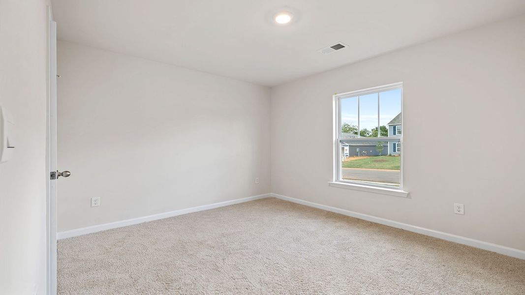 Spacious, unfurnished interior of a new home in Bentley Park, Greenwood (Image 16).
