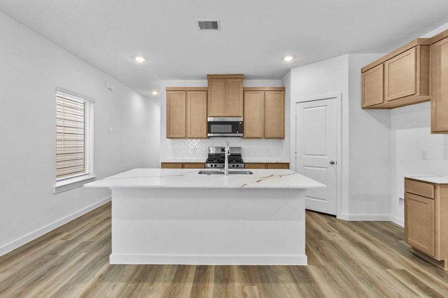 Furnished interior view inside a new home in Grand West, Houston (Image 11).