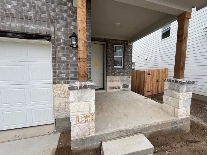Exterior details and patio area of a home in Lariat, Liberty Hill (Image 3).