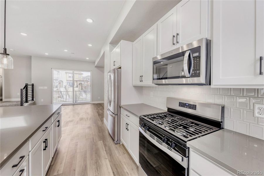 White cabs, taupe quartz counters