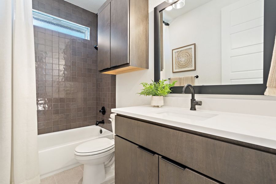 Furnished interior view inside a new home in Lagos Reserve, Manor (Image 31).