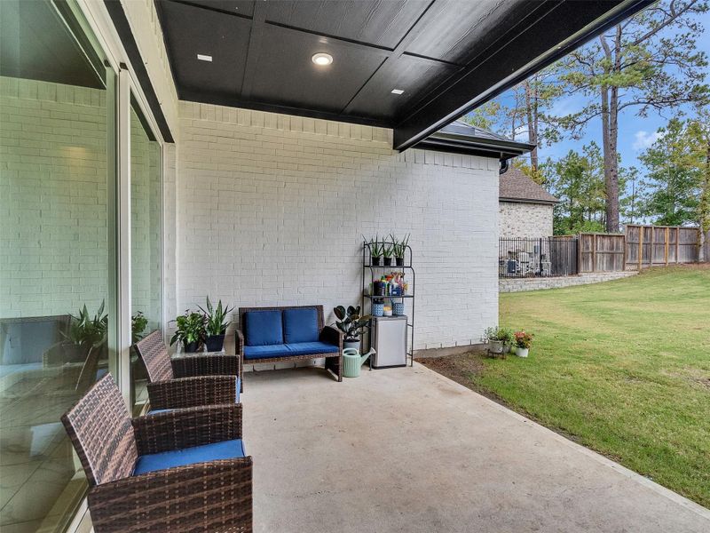 Exterior details and patio area of a home in , Conroe (Image 3). Exterior details and patio area of a home in , Conroe (Image 3).
