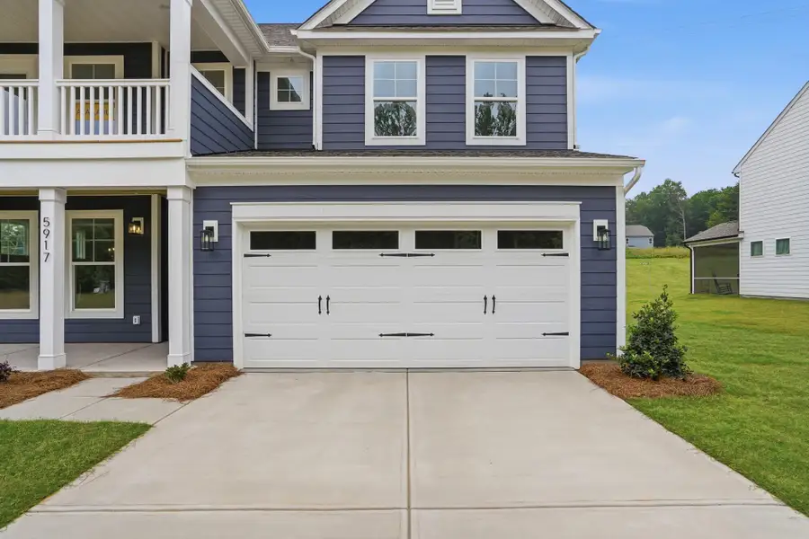 Exterior details and patio area of a home in Enclave at Riverdale, Huntersville (Image 2).