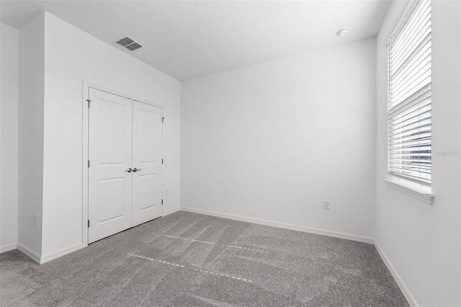 Spacious, unfurnished interior of a new home in Brack Ranch, St. Cloud (Image 39).