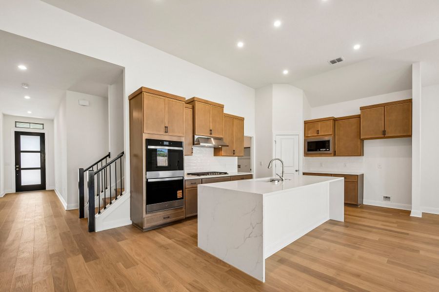 Furnished interior view inside a new home in Persimmon, Buda (Image 4).