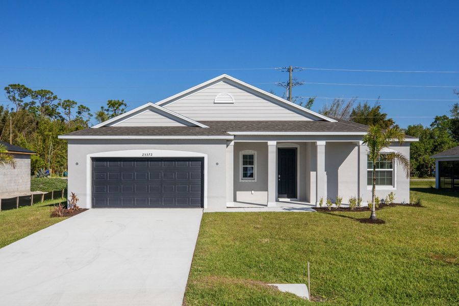 Representative exterior photo of a completed home built from the Clearwater by Maronda Homes in Port St. John, Cocoa, FL (Image 17).