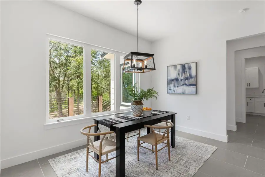 Tiled dining space with plenty of natural light Tiled dining space with plenty of natural light