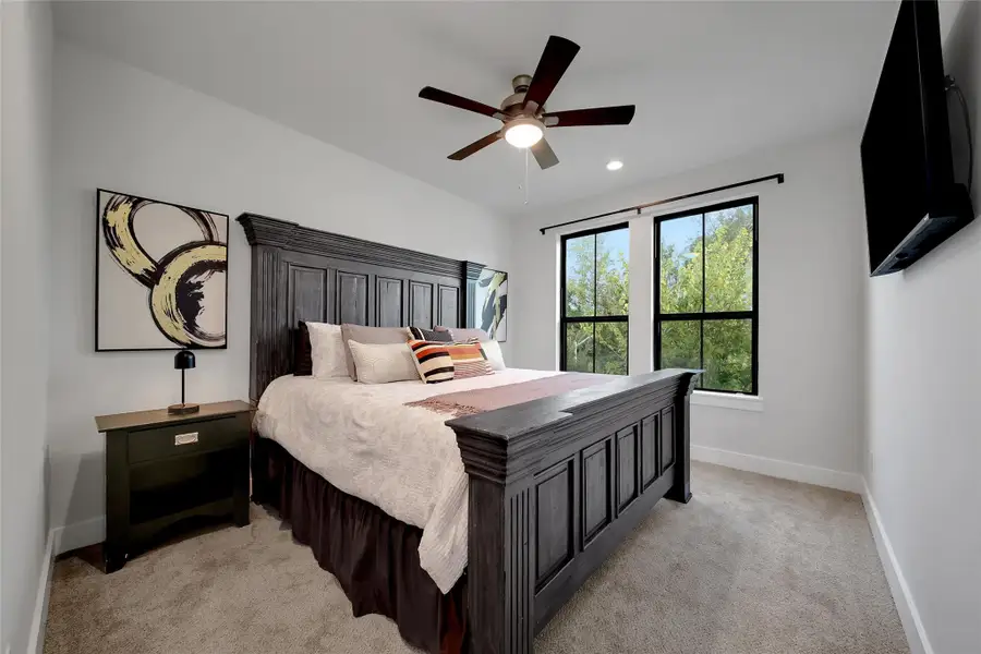 Furnished interior view inside a new home in ARTAVIA, Conroe (Image 32).