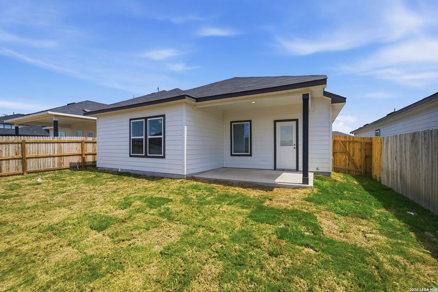 Exterior details and patio area of a home in Mesa Vista, Von Ormy (Image 20).