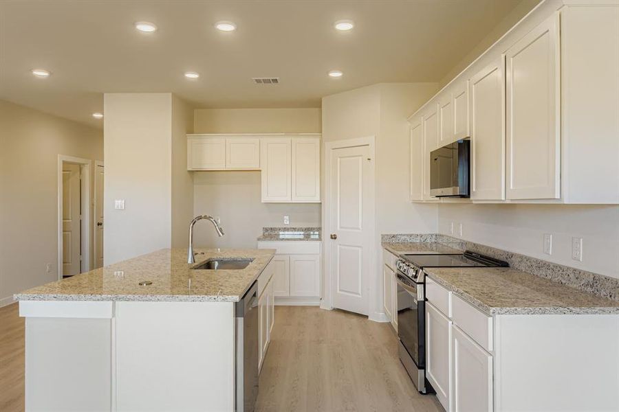 Furnished interior view inside a new home in Sperling Farms, Ferris (Image 11).