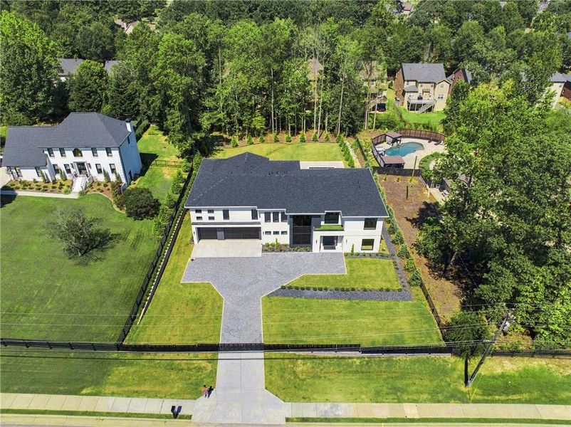 Front exterior of a new home in , Sugar Hill, GA, highlighting curb appeal (Image 31).