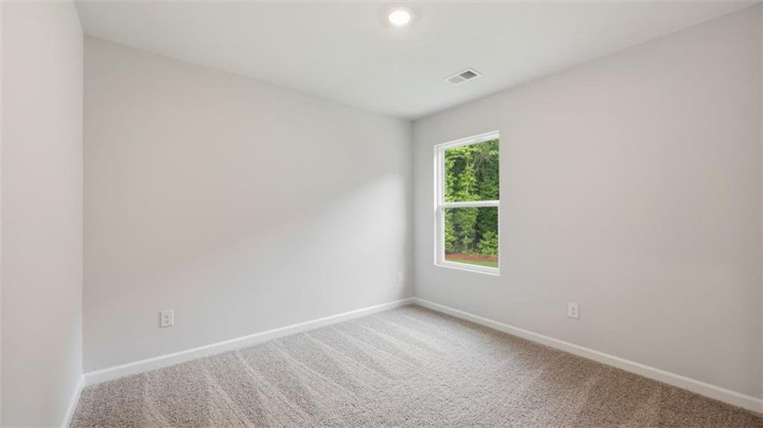 Spacious, unfurnished interior of a new home in Brookland Commons, Monroe (Image 19).