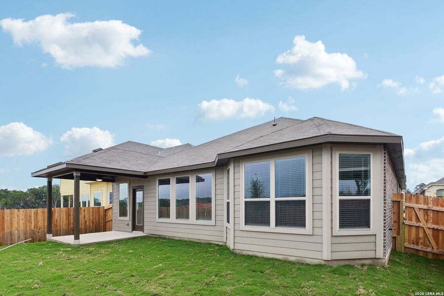 Exterior details and patio area of a home in Fox Falls, Boerne (Image 4).