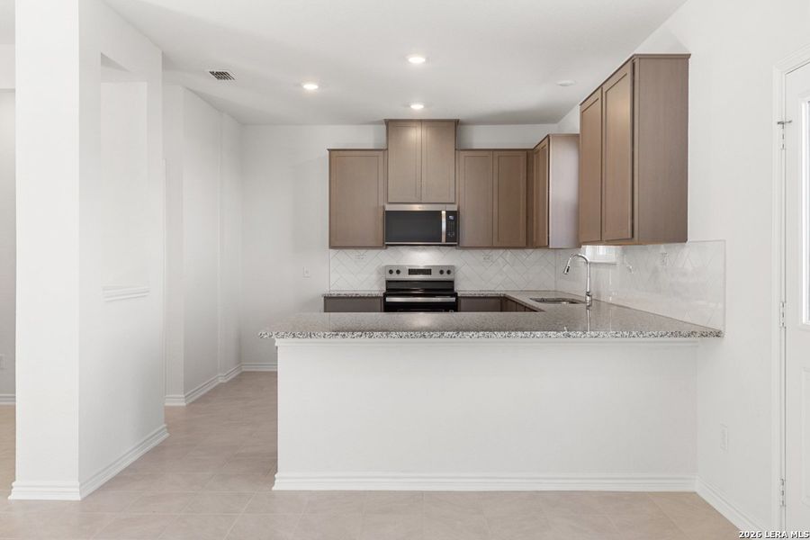 Furnished interior view inside a new home in Knox Ridge, Converse (Image 9).