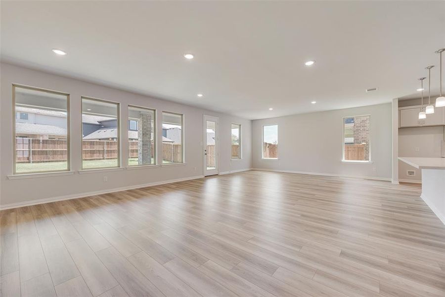 Spacious, unfurnished interior of a new home in Valencia On The Lake, Little Elm (Image 27).