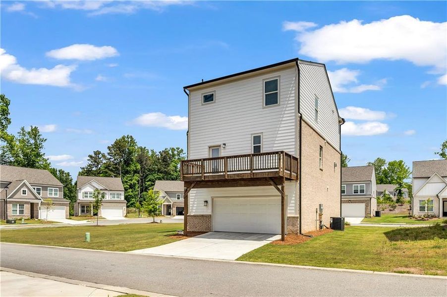 Front exterior of a new home in , Lawrenceville, GA, highlighting curb appeal (Image 28).