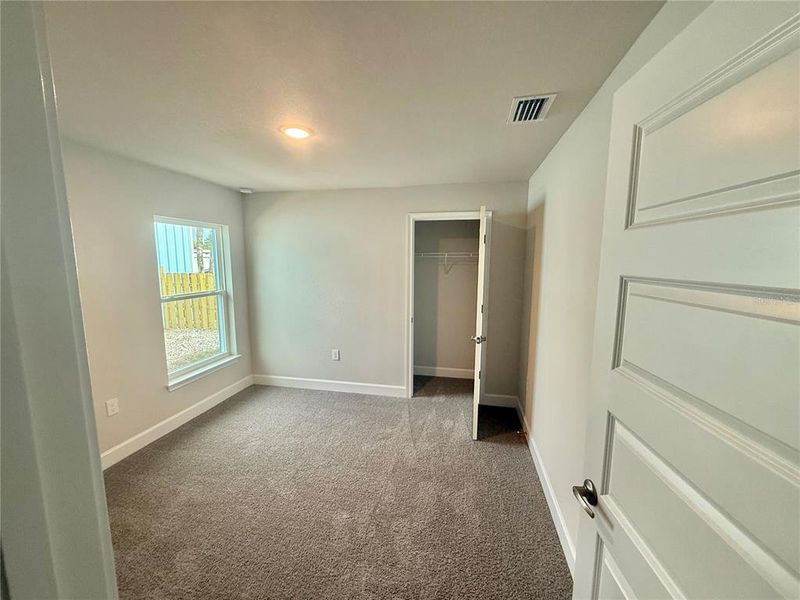 Spacious, unfurnished interior of a new home in , Port Charlotte (Image 29).