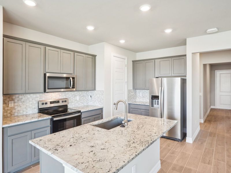 Furnished interior view inside a new home in Crescent Lakes - Reserve Series, Punta Gorda (Image 6).