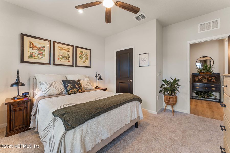 Furnished interior view inside a new home in Seminole Palms Single-Family Homes, Palm Coast (Image 56).