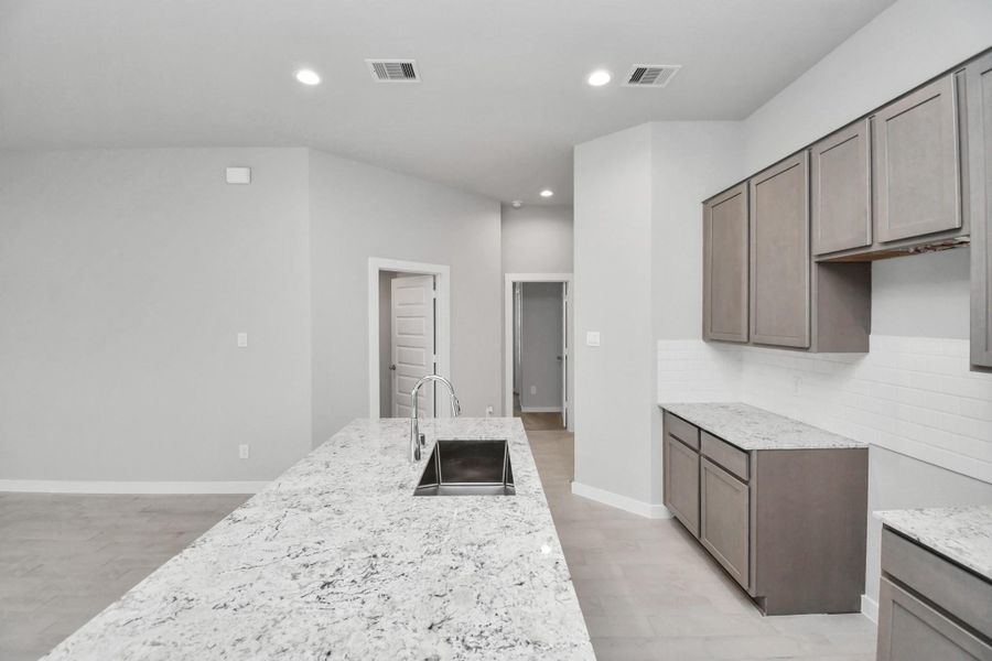 This generously spacious kitchen is a dream realized!