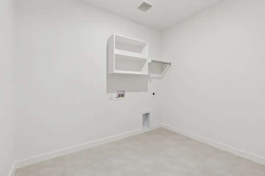 Utility in the Heisman home plan by Trophy Signature Homes – REPRESENTATIVE PHOTO