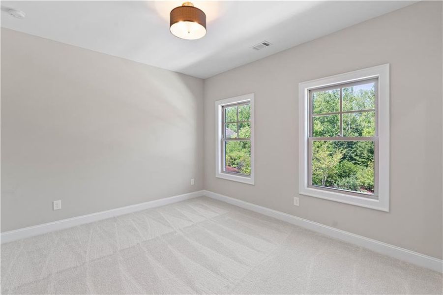 Spacious, unfurnished interior of a new home in Bellwyn, Johns Creek (Image 30).